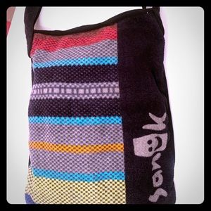 Sanuk towel in a bag